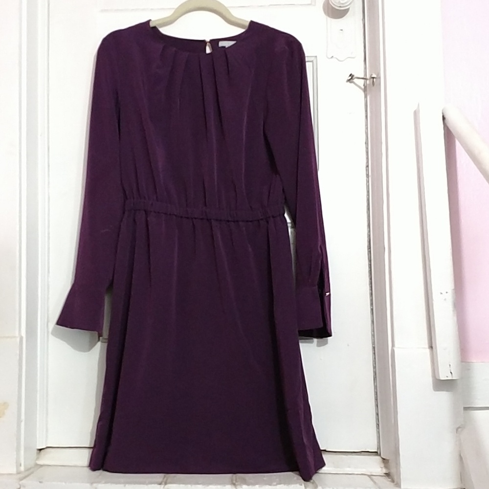 Gorgeous gem colored knee length dress